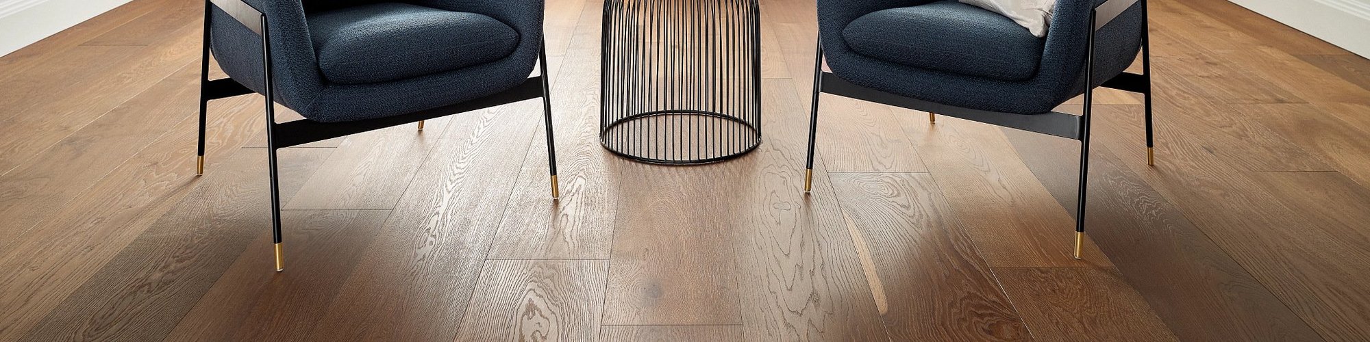 two arm chairs on wood floors - Dishman Flooring Center