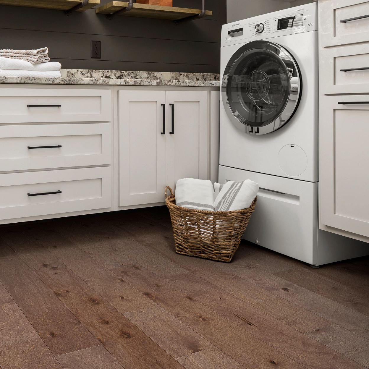 Brown hardwood floor for laundry room from Dishman Flooring on Houma, LA area